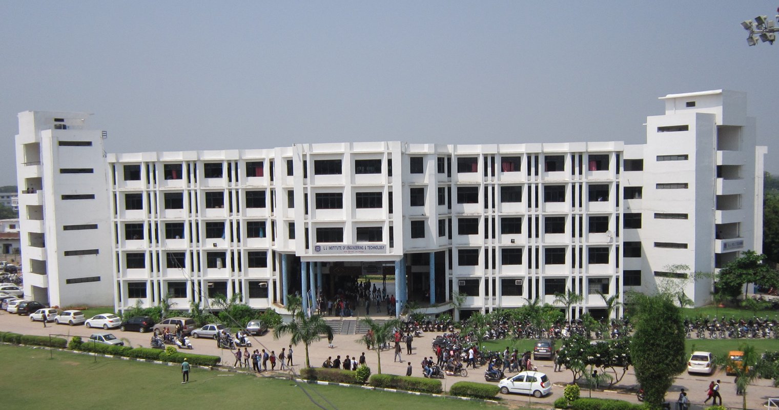 The L. J. Institute of Engineering and Technology building in Ahmedabad, with students outside the main entrance